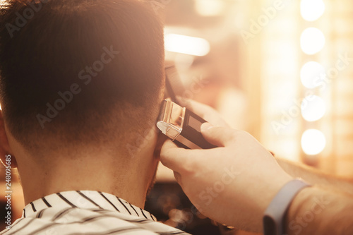 Barber shop, Man in chair, hairdresser styling his hair