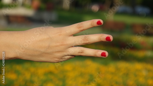 Female Hand Counting Three