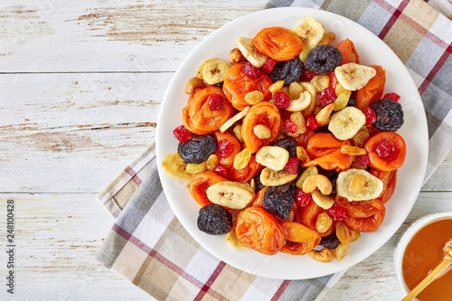 Fototapeta Naklejka Na Ścianę i Meble -  dried Fruits, Nut honey, top view, flat lay