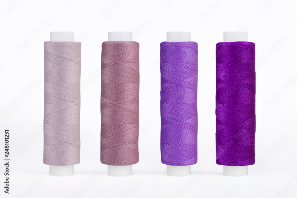 Set of sewing thread coils, miscellaneous colours, isolated on white Set of sewing thread coils, miscellaneous colours, isolated on white