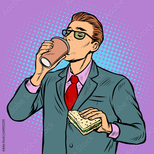 man drinking coffee and eating sandwich