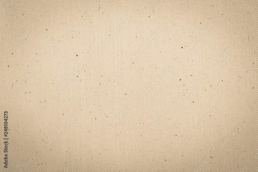 Calico fabric cloth texture background in light cream beige color Calico fabric cloth texture background in light cream beige color