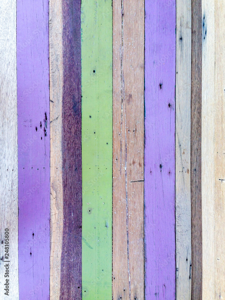 Painted wood texture pattern background in purple green brown color vintage style Painted wood texture pattern background in purple green brown color vintage style