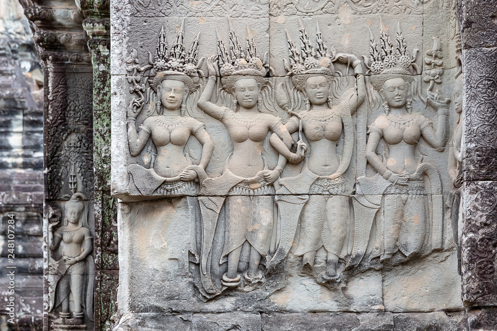 stone carving of Apsaras on a wall, Angkor Wat, Siem Reap, Cambodia, Asia