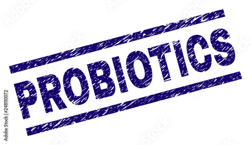 PROBIOTICS seal print with distress style. Blue vector rubber print of PROBIOTICS tag with corroded texture. Text tag is placed between parallel lines.