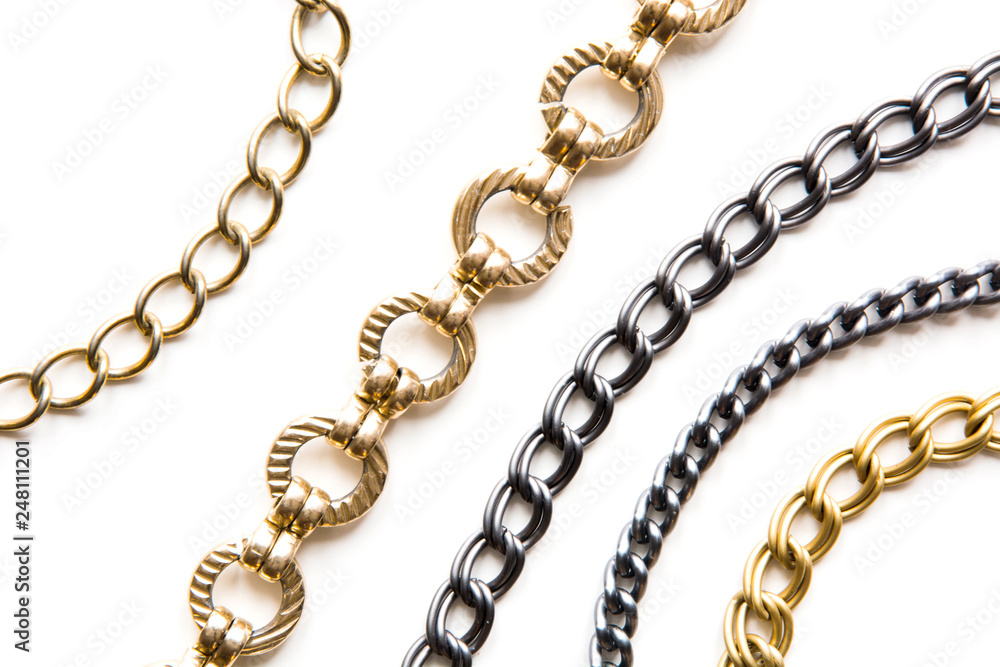 Obraz premium Golden and blue chain on white. Luxury pattern.