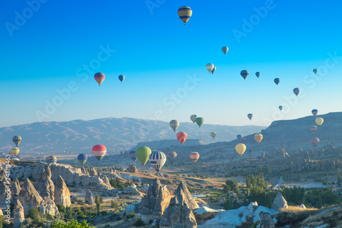Colorful hot-air balloons flying over the cappadocia