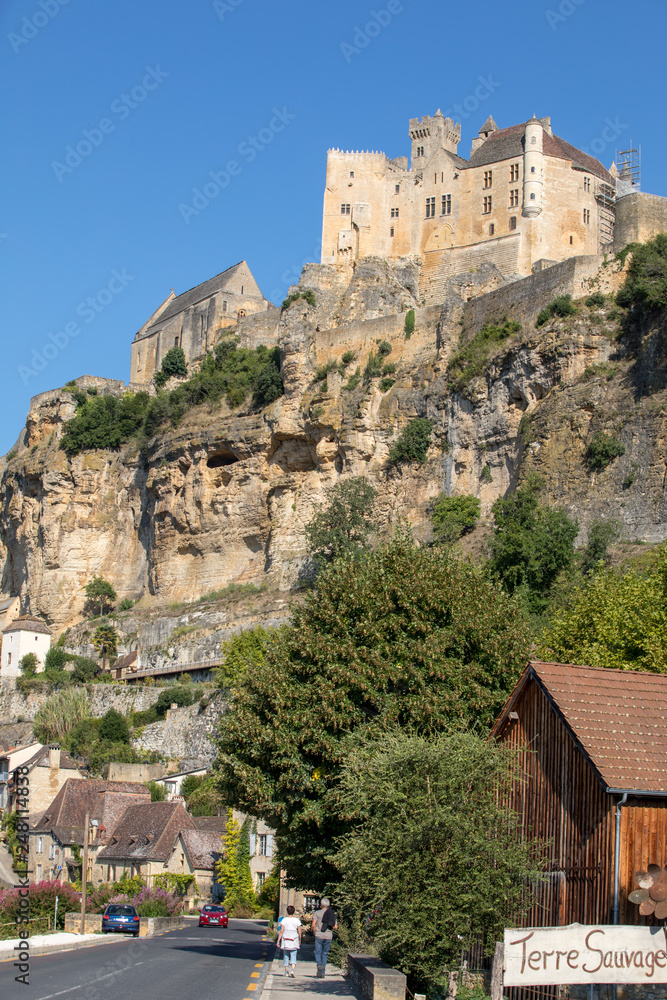Beynac et Cazenac, France - September 4, 2018: the medieval Chateau de Beynac rising on a limestone cliff above the Dordogne River. France, Dordogne department, Beynac-et-Cazenac