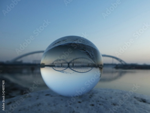 Morning landscape bridge in lensball