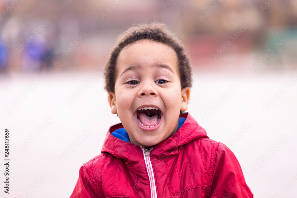 cute Afro american boy laughing, happiness concept cute Afro american boy laughing, happiness concept