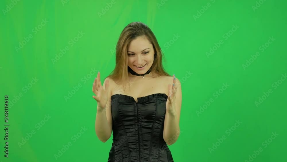 Evil smiling witch looks for someone at magic ball green screen Evil smiling witch looks for someone at magic ball green screen