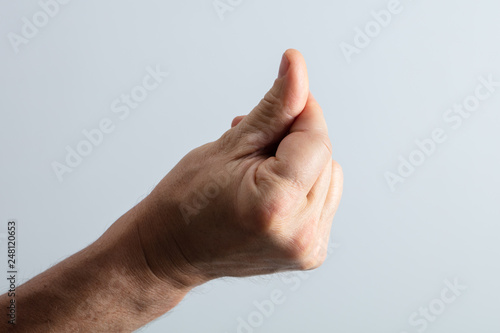 Man's Hand Snapping His Finger