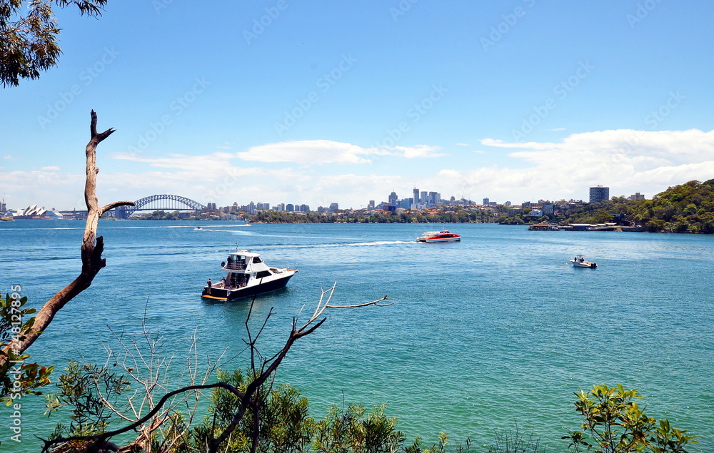 View on Sydney Harbor Bridge and Sydney Opera House from Mosman Bay to