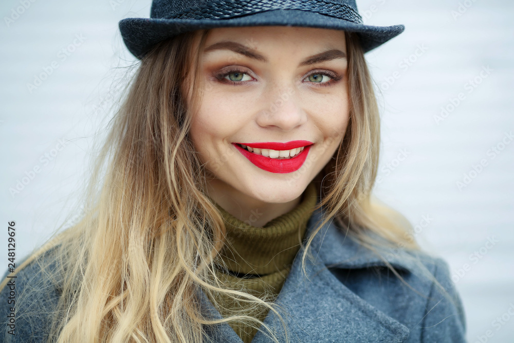 Outdoor fashion portrait of young beautiful fashionable woman wearing stylish accessories.vintage hat,looking at camera. Female fashion beauty and advertisement concept. Close up. Copy space for text. Outdoor fashion portrait of young beautiful fashionable woman wearing stylish accessories.vintage hat,looking at camera. Female fashion beauty and advertisement concept. Close up. Copy space for text.