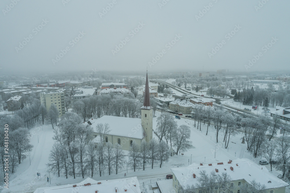 Obraz premium Aerial view of the city on a cold winter day. Sunset on a winter day.