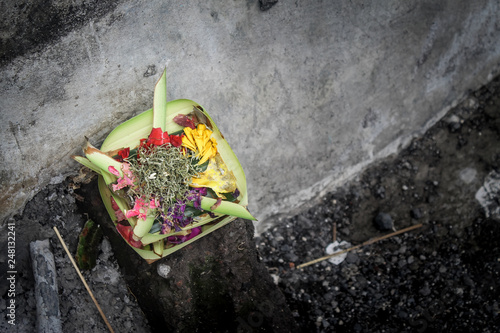 Balinese Hindu Offerings Called Canang. Canang Sari is one of the daily Offerings made by Balinese Hindus to thank the Sang Hyang Widhi Wasa in Praise and Prayer. Seen everywhere in Bali. photo