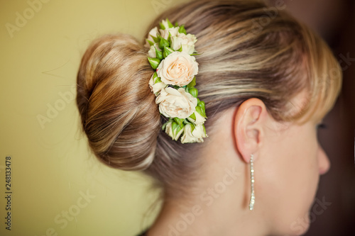 Female Elegant wedding hairstyle for the wedding, unrecognizable rear view.