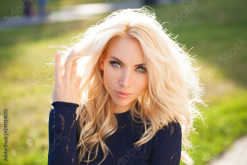 Portrait close up of young beautiful blonde woman