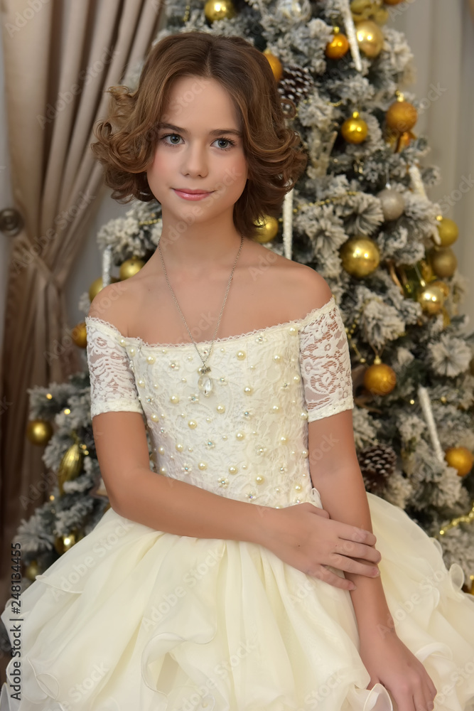 beautiful girl in white dress in christmas beautiful girl in white dress in christmas