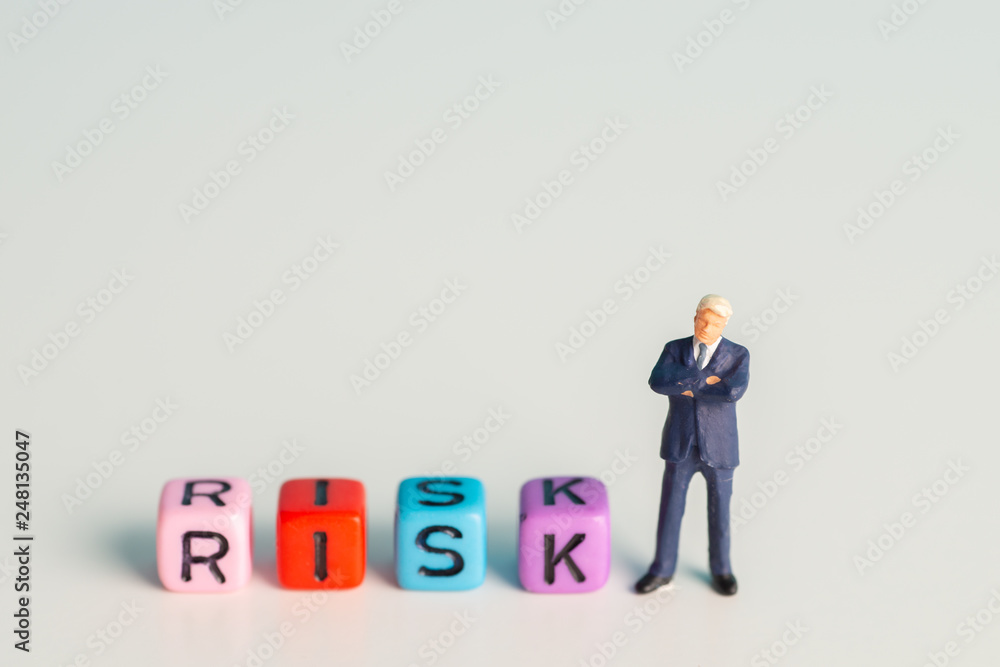 Miniature toys - risk concept. Miniature toys - risk concept.