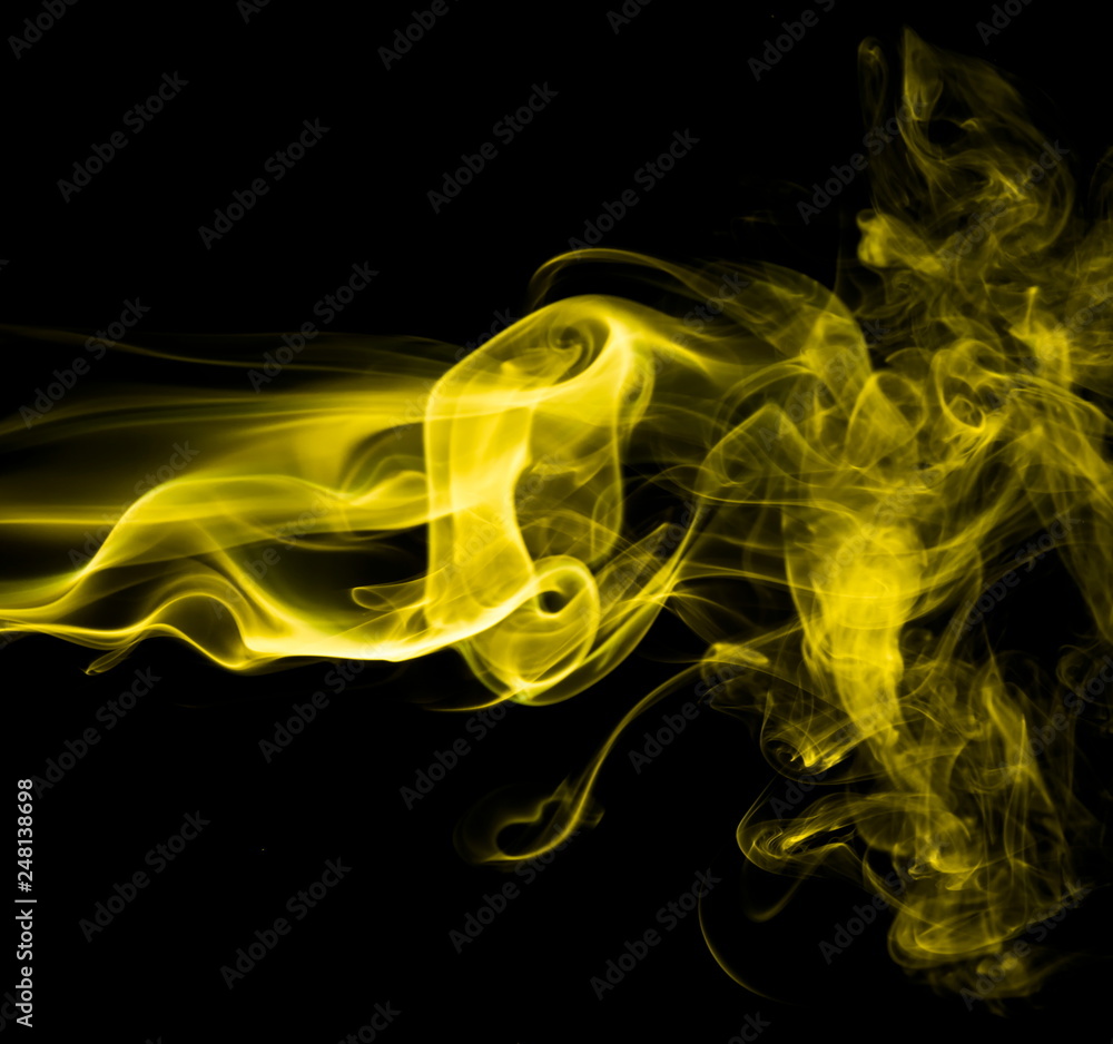 Yellow smoke on black background Yellow smoke on black background