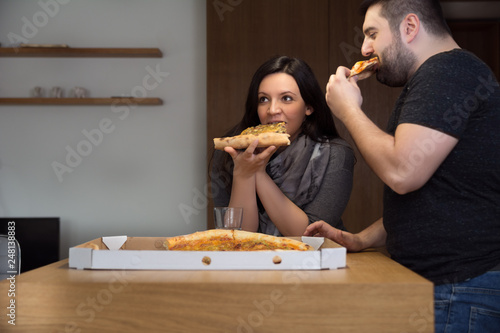 Wallpaper Mural Friends eating pizza at home Torontodigital.ca