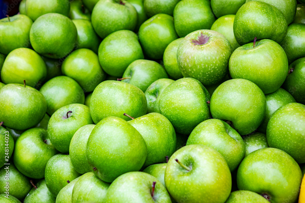 Bunch of green apples in supermarket Bunch of green apples in supermarket