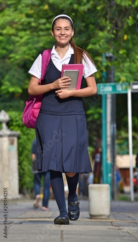 Female Student Walking To School