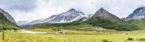 Beautiful scene in the Daocheng Yading National Nature Reserve (know as Nyidên in Tibetan), Ganzi, Sichuan, China photo