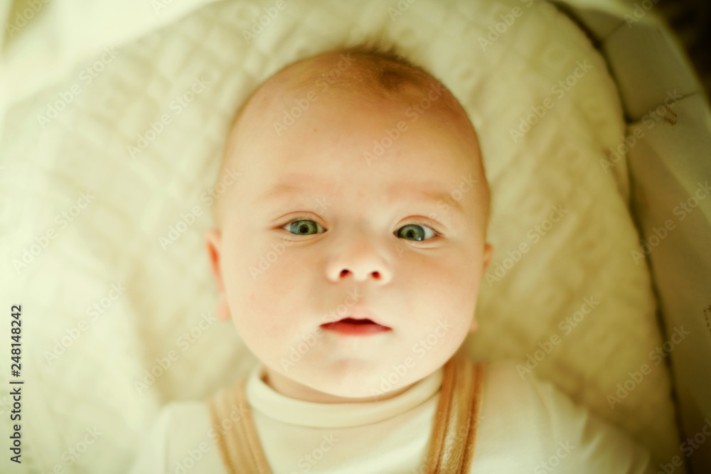 Beautiful little boy newborn portrait, laugh, surprise Beautiful little boy newborn portrait, laugh, surprise