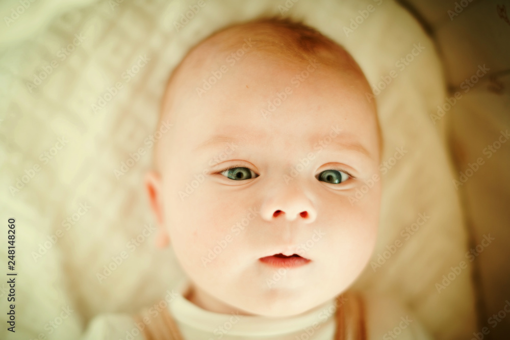 Beautiful little boy newborn portrait, laugh, surprise Beautiful little boy newborn portrait, laugh, surprise