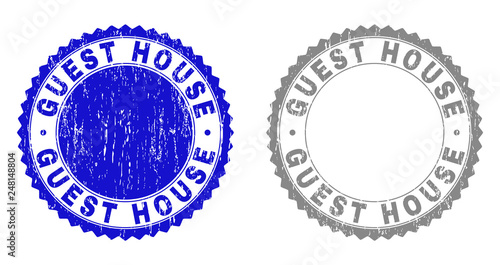 Grunge GUEST HOUSE stamp seals isolated on a white background. Rosette seals with distress texture in blue and gray colors. Vector rubber stamp imitation of GUEST HOUSE tag inside round rosette.