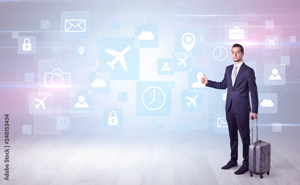 Businessman departs to a business trip with social media and travel symbol concept
Businessman departs to a business trip with social media and travel symbol concept