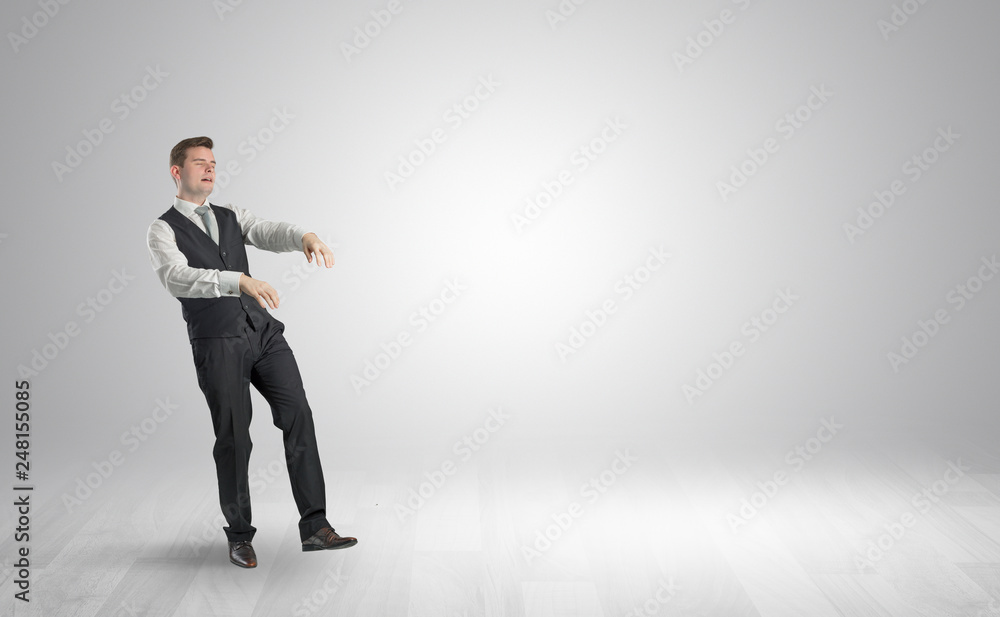 Zombi, sleepy maniac businessman walking in a copy space
Zombi, sleepy maniac businessman walking in a copy space