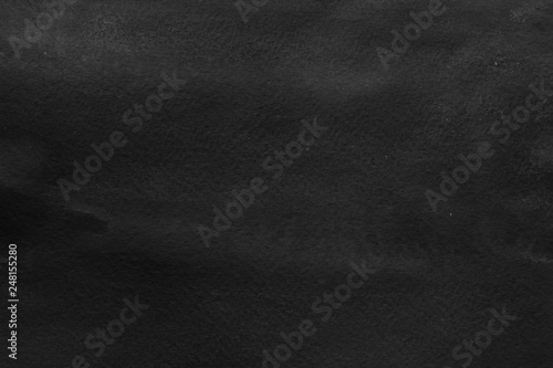 Black watercolor texture with abstract washes and brush strokes on the white paper background. Digital paper background.