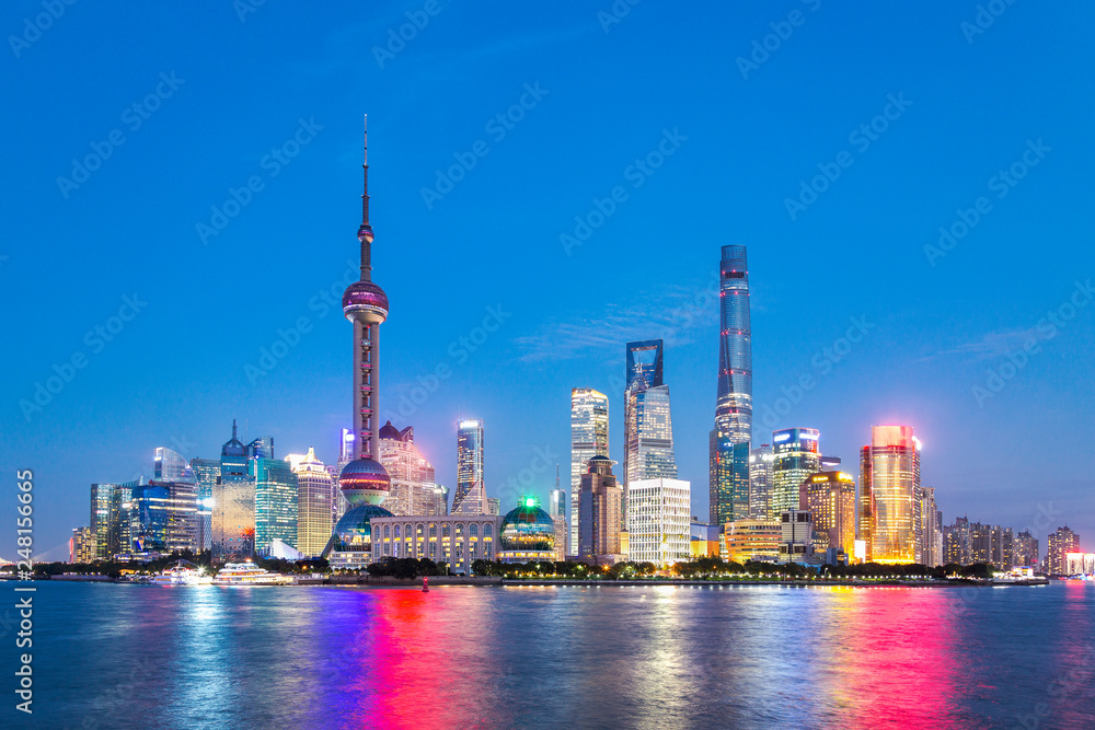 Obraz premium Night Scenery of International Metropolis, Urban Skyline of Seaside