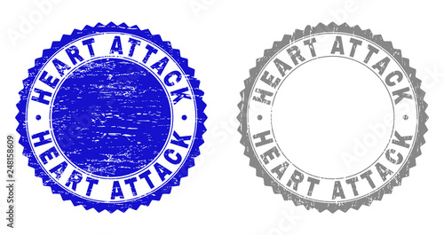 Grunge HEART ATTACK stamp seals isolated on a white background. Rosette seals with grunge texture in blue and gray colors. Vector rubber stamp imprint of HEART ATTACK tag inside round rosette.