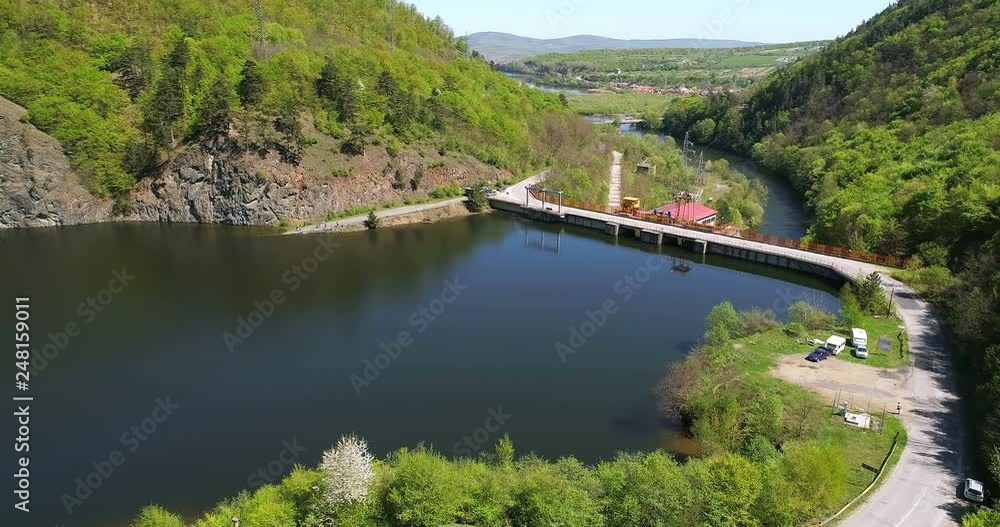 Aerial view of lake destination and a hydroelectric dam summer day Aerial view of lake destination and a hydroelectric dam summer day
