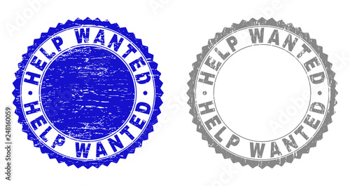 Grunge HELP WANTED stamp seals isolated on a white background. Rosette seals with grunge texture in blue and gray colors. Vector rubber stamp imitation of HELP WANTED label inside round rosette.