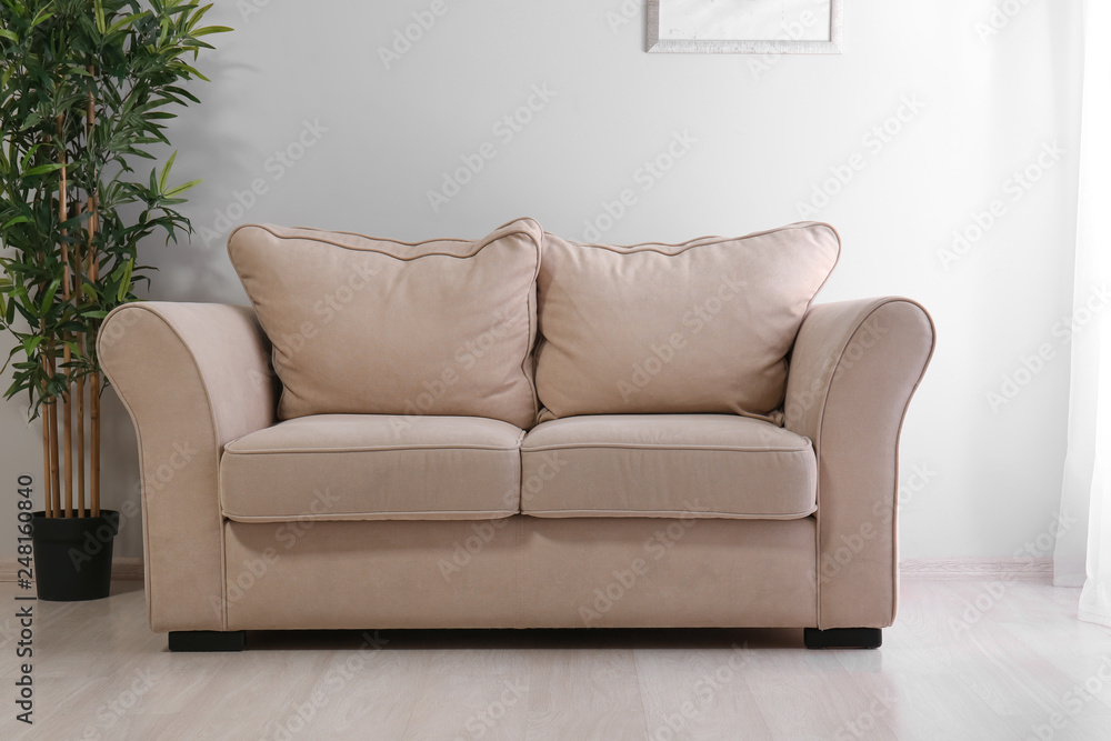 Interior of modern room with comfortable sofa Interior of modern room with comfortable sofa