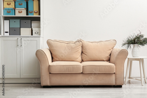 Interior of modern room with comfortable sofa