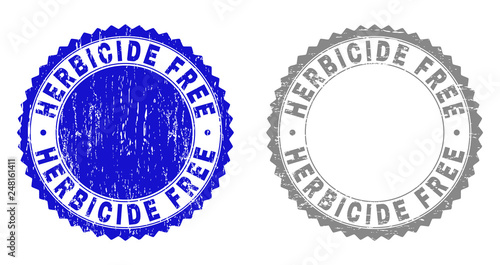 Grunge HERBICIDE FREE stamp seals isolated on a white background. Rosette seals with grunge texture in blue and gray colors. Vector rubber stamp imprint of HERBICIDE FREE caption inside round rosette. photo