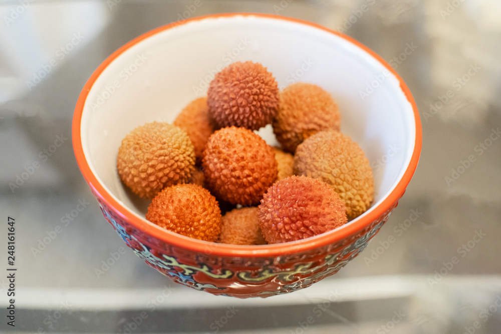 Tropical fruit lychee in the bowl. Fresh lychee. Delicious tropical fruit. Tropical fruit lychee in the bowl. Fresh lychee. Delicious tropical fruit.