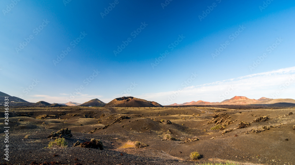 Beautiful landscape with volcano El Cuervo in Lanzarote, Canary Islands in Spain. Beautiful landscape with volcano El Cuervo in Lanzarote, Canary Islands in Spain.