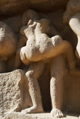 Erotic sculptures at Vishvanatha Temple at the  Western temples of Khajuraho in Madhya Pradesh, India. UNESCO World heritage site.