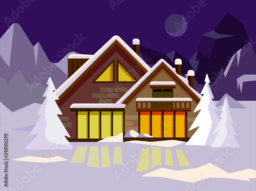 Chalet house in winter mountain valley full of snow at night