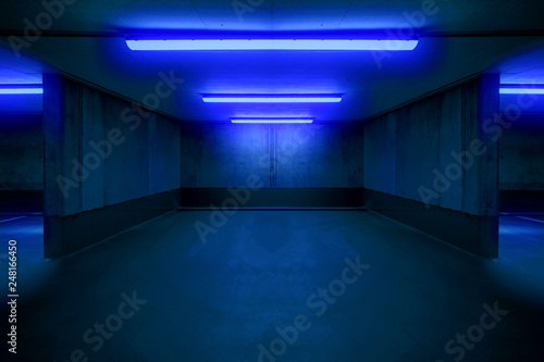 illuminated parking lot / underground car parking spot - photo