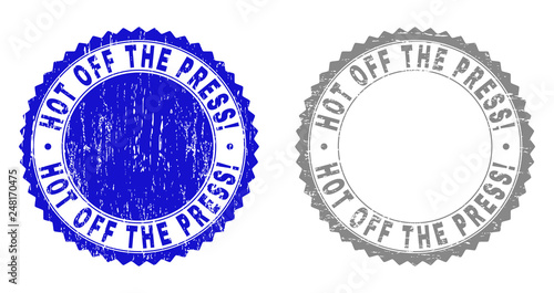 Grunge HOT OFF THE PRESS! stamps isolated on a white background. Rosette seals with grunge texture in blue and grey colors.