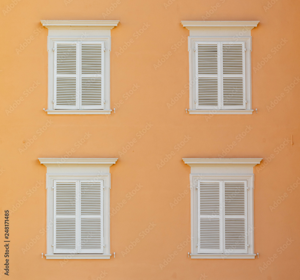 wooden shutter in white color gives a harmonic background