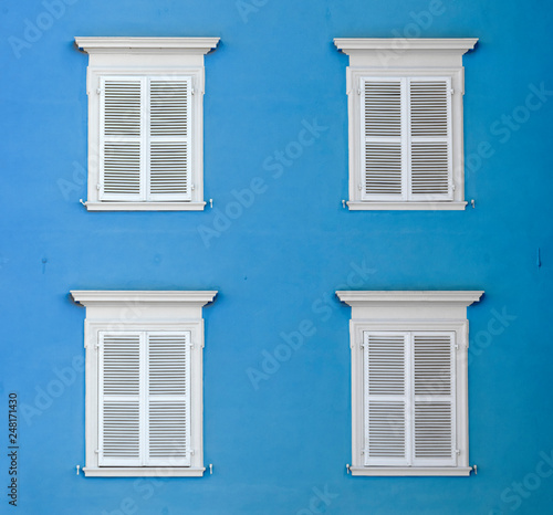 Wallpaper Mural wooden shutter in white color gives a harmonic background Torontodigital.ca